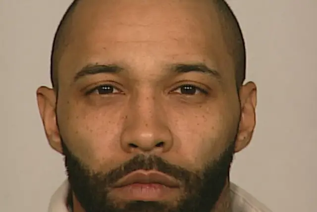 Joe Budden, now in the hands of the NYPD. 